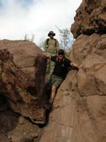 26-Mike_climbing_down_boulder