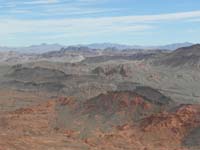 60-zoomed_view_of_terrain-volcanic_rock_flowing_over_sandstone-looking_E