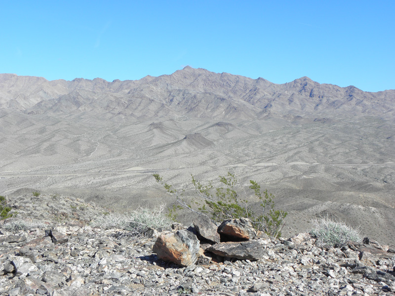 37-registry_under_pile_of_rocks-Mt_Wilson_in_background