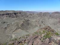 36-view_from_peak-looking_NW-future_exploratory_consideration-dirt_road_to_upper_left