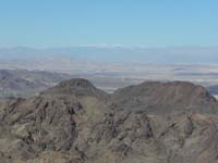 37-view_from_peak-looking_NW-zoomed_view_of_Mt_Charleston_over_55_miles_away