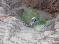 32-Luba_rappelling_down