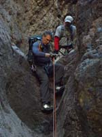 54-Greg_starting_the_rappel-quite_a_low_start_to_keep_low_angle_since_anchor_so_close_to_edge