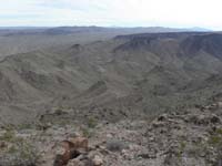 33-1.6_mile_route_down-faster_and_less_ups_and_downs-follow_ridge_in_middle_to_right_drainage_to_dirt_road