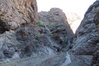 045-point_to_go_up_to_left-sandbags_for_spring_pool_a_little_further_up_canyon
