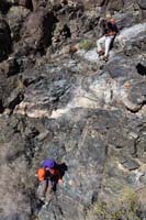 28-Luba_and_Ed_scrambling_down_good_pour_over_rock
