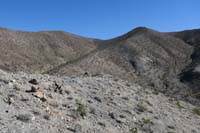 20-looking_back_to_desert_terrain_with_Peanut_and_Butter_Peaks_in_background