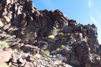 20-garnet_schist_wall-vertical_layers_to_left,curved_layers_in_center,horizontal_layers_to_right-amazing_geologic_forces