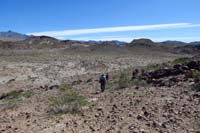 59-up_and_over_last_hump-now_cross_desert_reaching_Hwy_93_and_the_car