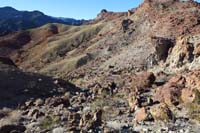 57-looking_back_to_group_heading_up_rocky_slope_avoiding_the_cliff