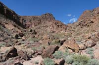 21-ascending_to_saddle_to_right,interesting_cave_to_left