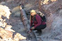 09-Arcy_touching_the_old_historic_water_pipe