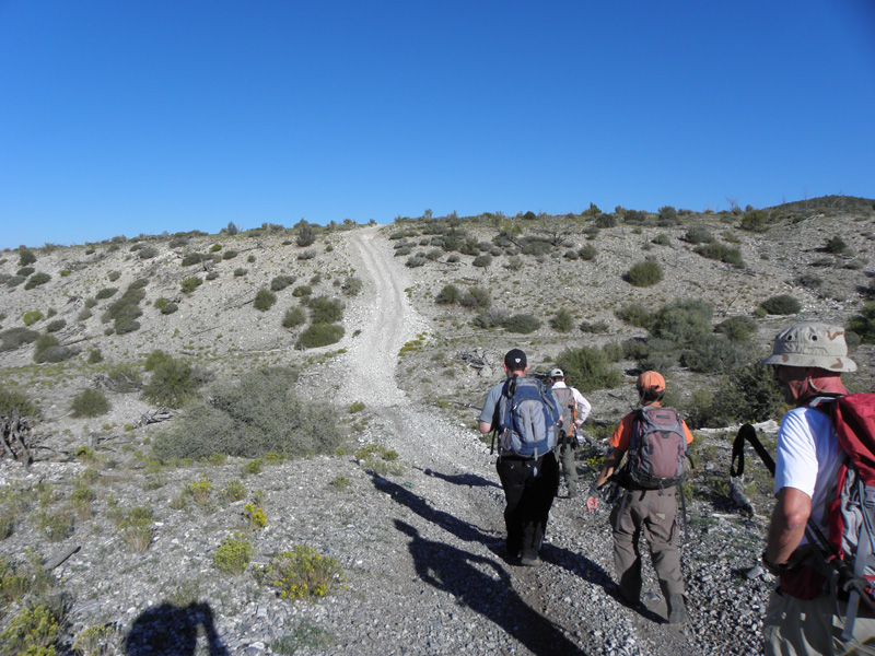 57-group_hiking_along_road_back_to_vehicles