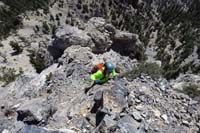 24-scrambled_down,but_then_back_up_a_steep_loose_cliff,Ed_coming_up_easier_way