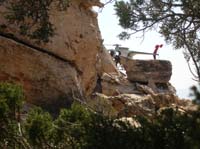27-SAR_rescuer_climbing_out_of_the_helicopter