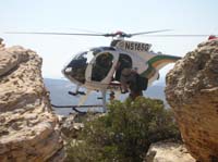 34-extremely_talented_pilot-landing_with_one_skid-hovering_in_place-steady_no_movement