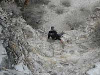 52-Peppe_climbing_down_a_dry_waterfall