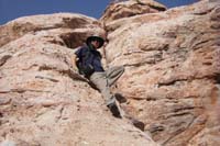 104-me_climbing_down_sandstone-from_Luba