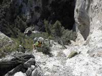 40-Harlan_checking_out_bad_way_down-went_up_and_further_to_descend_another_easier_drainage