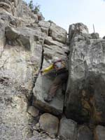 32-Ed_using_leverage_and_hand_holds_to_climb