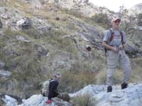 50-carefully_traversing_the_wet_grassy_area_to_waterfall_canyon