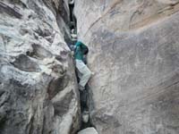 50-me_squeezing_down_a_crack-from_Luba