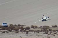 33-someone_checking_out_helicopter-turns_out_hard_landing_by_student_pilot