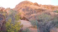 55-looking_up_to_rappel_before_passing_through_Calico_Arch
