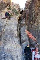 49-Richard_throws_Luba_the_rope_to_set_up_for_the_next_rappel