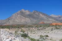 15-Little_Red_Rock_with_Damsel_Peaks