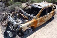 24-abandoned_veihicle_along_dirt_road