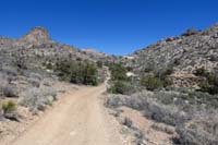 26-continuing_up_the_dirt_road_via_mountain_pass