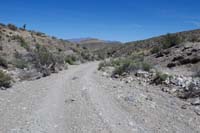 52-continuing_up_a_dirt_road_heading_NE