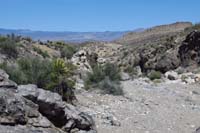 55-walking_through_a_scenic_and_rough_wash