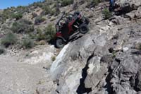 56-ATV_navigates_a_steep_section_of_limestone_in_the_wash