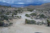 60-more_steep_down,merges_to_main_road