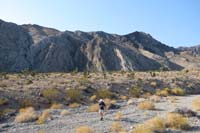 06-looking_back_to_Laszlo_on_the_route_traveling_up_a_desert_wash