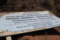 63-old_mining_private_land_sign_laying_on_the_ground