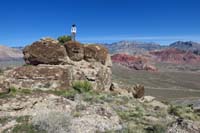 018-Kenny_on_another_boulder_with_Calico_Hills_in_background