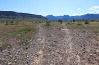65-heading_up_left_fork_which_is_simply_a_slog_through_the_desert_for_a_while,Brokeback_Mt_to_R