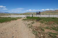 66-looking_back_to_Moenkopi_TH_parking_area-Brokeback_Mt_Trail_continues_across_road