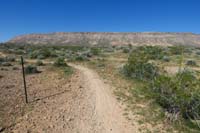 040-Gnarley_TH-barbed_wire_fence_cut_to_allow_access_to_desert