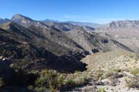 34-looking_back-we'll_follow_humpy_ridges_to_left,then_down_via_drainage_in_center