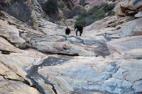 22-looking_back_to_Brett_and_Eric_ascending_the_grippy_steep_sandstone