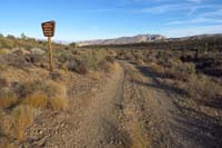 68-right_away_encounter_sign_indicating_leaving_Spring_Mountains_NRA-continue_along_dirt_road