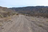 08-continuing_along_road_to_what_used_to_be_a_parking_area,but_blocked_off_now