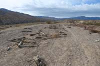09-looking_back_to_old_dirt_parking_lot_which_is_now_blocked_with_debris
