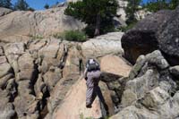 22-Daddy_scrambling_along_the_rocks_on_the_stream