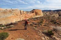 17-return_to_Thunderstorm_Arch,then_right_(south)_via_usage_trail_at_base_of_cliff_to_right_of_Crazy_Hill