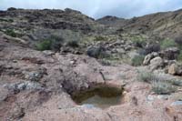 43-lone_watering_hole_in_the_middle_of_seemingly_nowhere